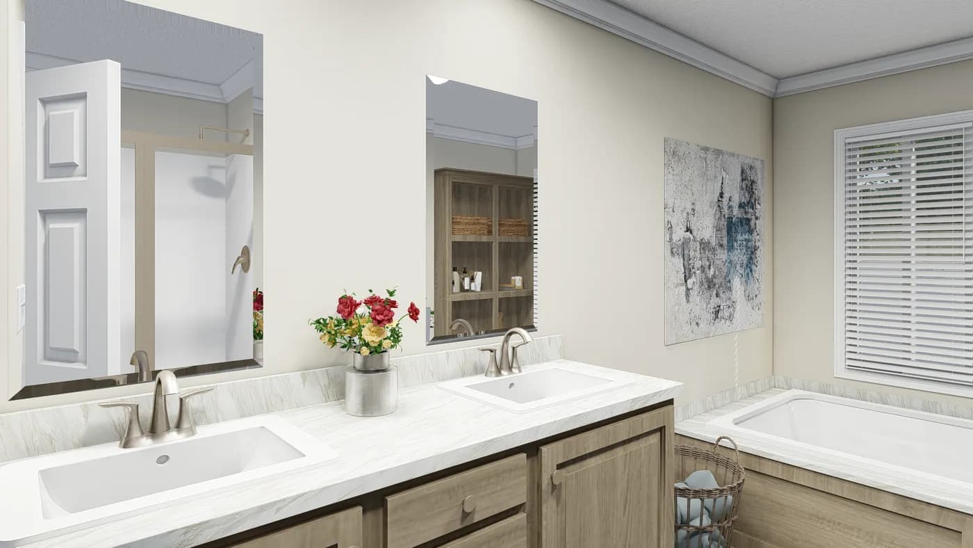 The CAROLINIAN M5010 Primary Bathroom. This Manufactured Mobile Home features 3 bedrooms and 2 baths.