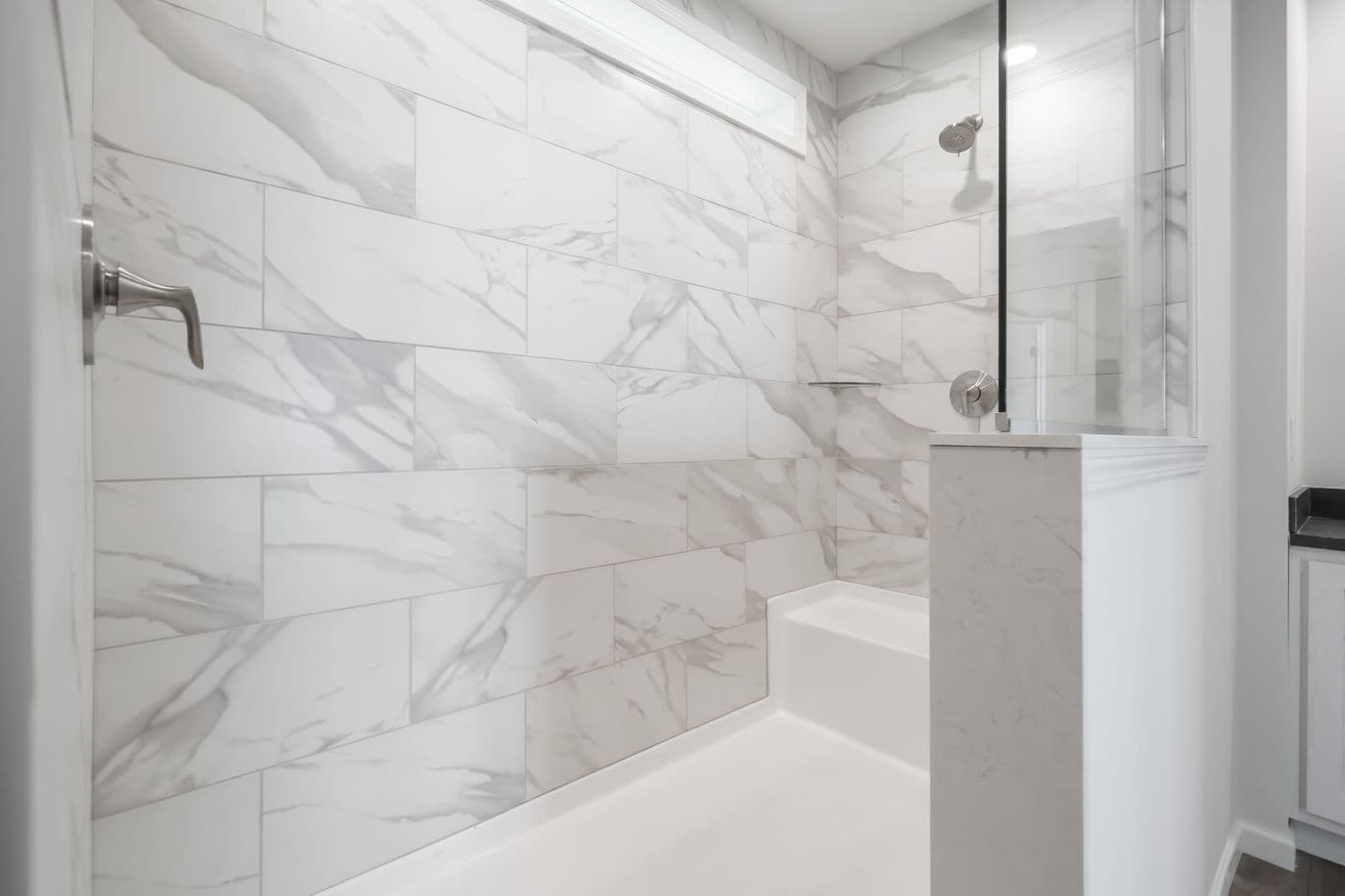 The 1533 THE BROOK HUD Primary Bathroom. This Manufactured Mobile Home features 3 bedrooms and 2 baths.