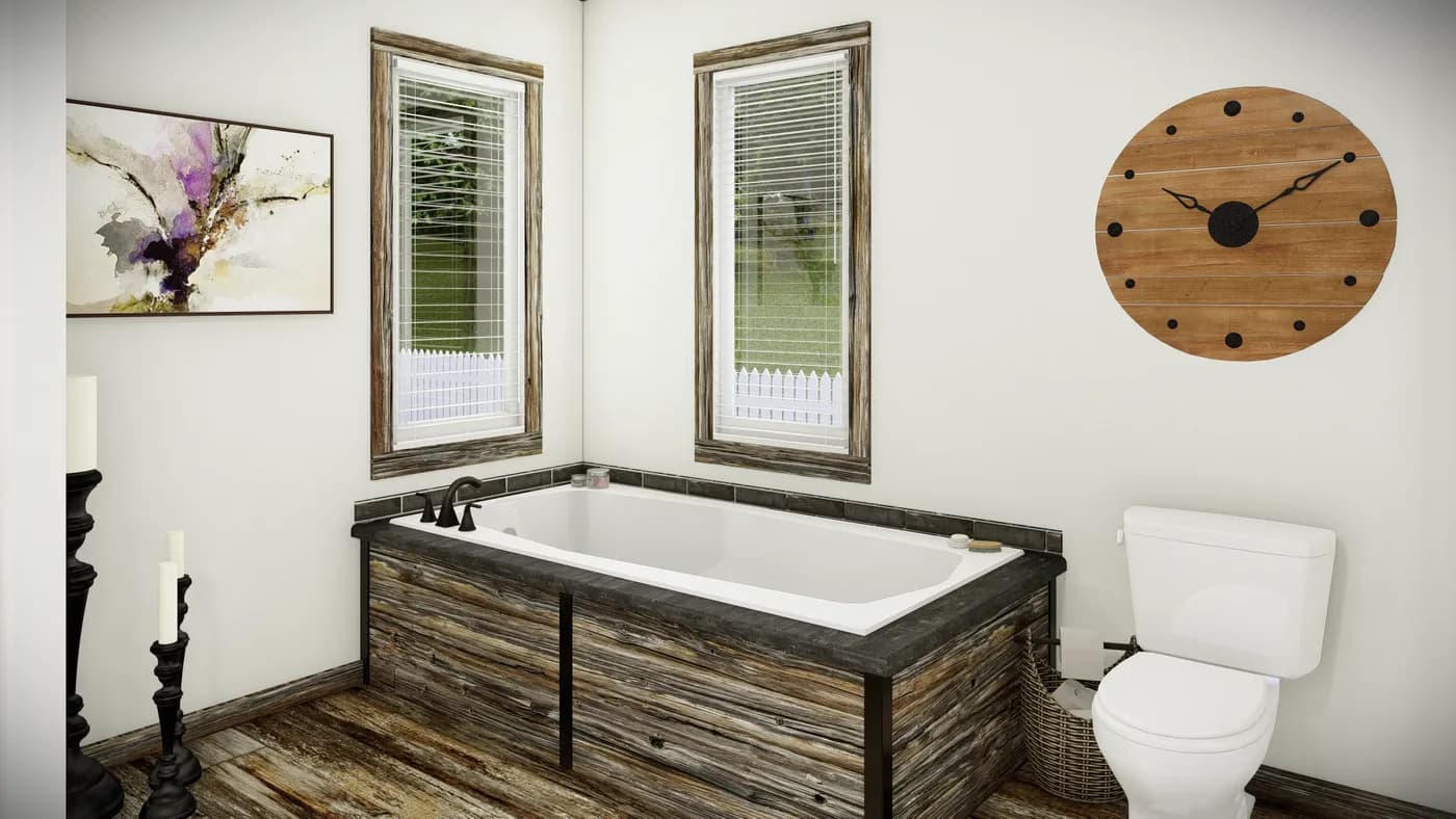 The THE SUMNER Primary Bathroom. This Manufactured Mobile Home features 3 bedrooms and 2 baths.