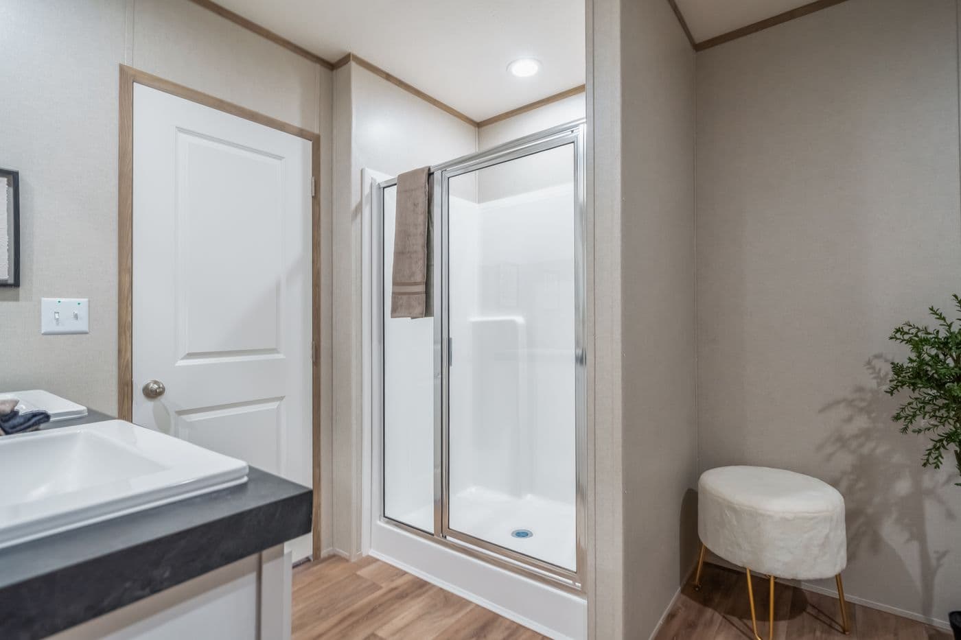 The ECLIPSE Primary Bathroom. This Manufactured Mobile Home features 4 bedrooms and 2 baths.
