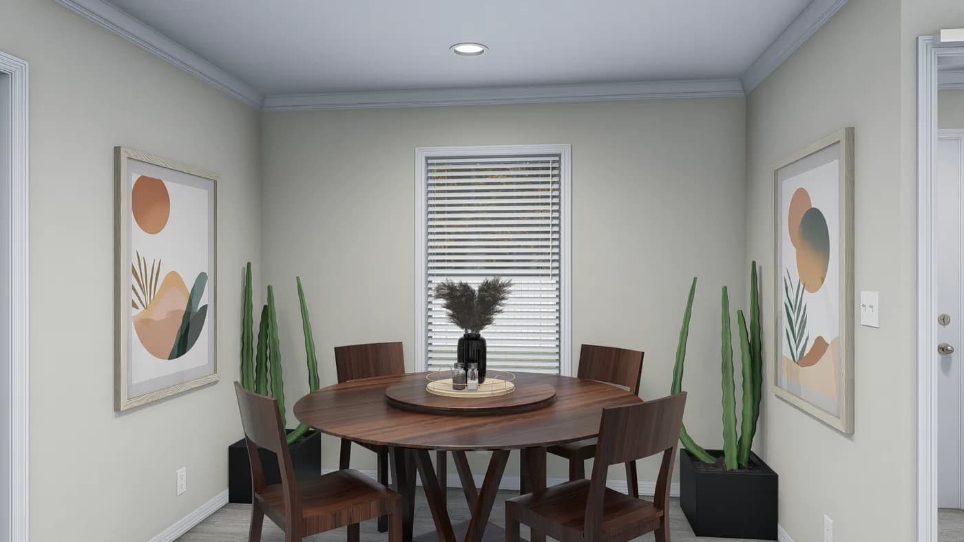 The 4207 "EMERALD" 7616 Dining Area. This Manufactured Mobile Home features 3 bedrooms and 2 baths.