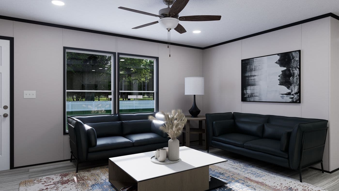 The THE MOUNTAINEER 56 Living Room. This Manufactured Mobile Home features 3 bedrooms and 2 baths.