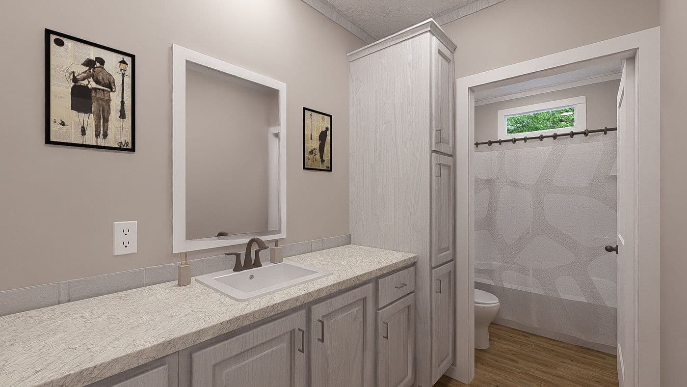 The THE HEXAGON Guest Bathroom. This Manufactured Mobile Home features 4 bedrooms and 3 baths.