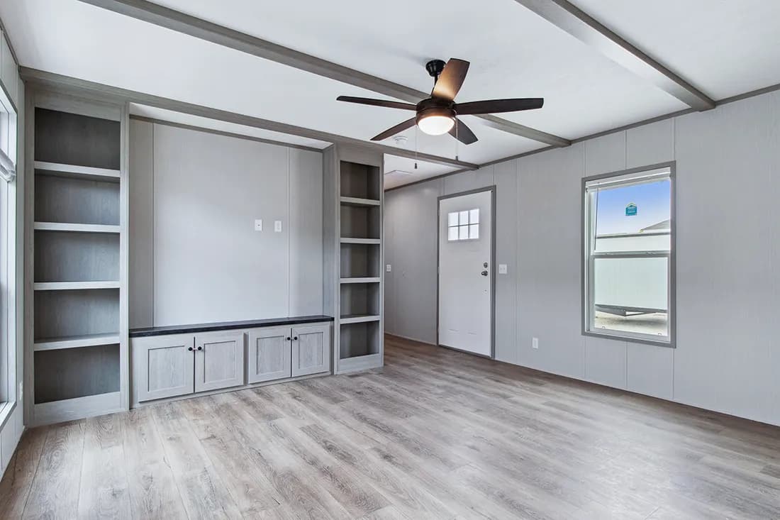 The ANNIVERSARY 16682F Living Room. This Manufactured Mobile Home features 2 bedrooms and 2 baths.