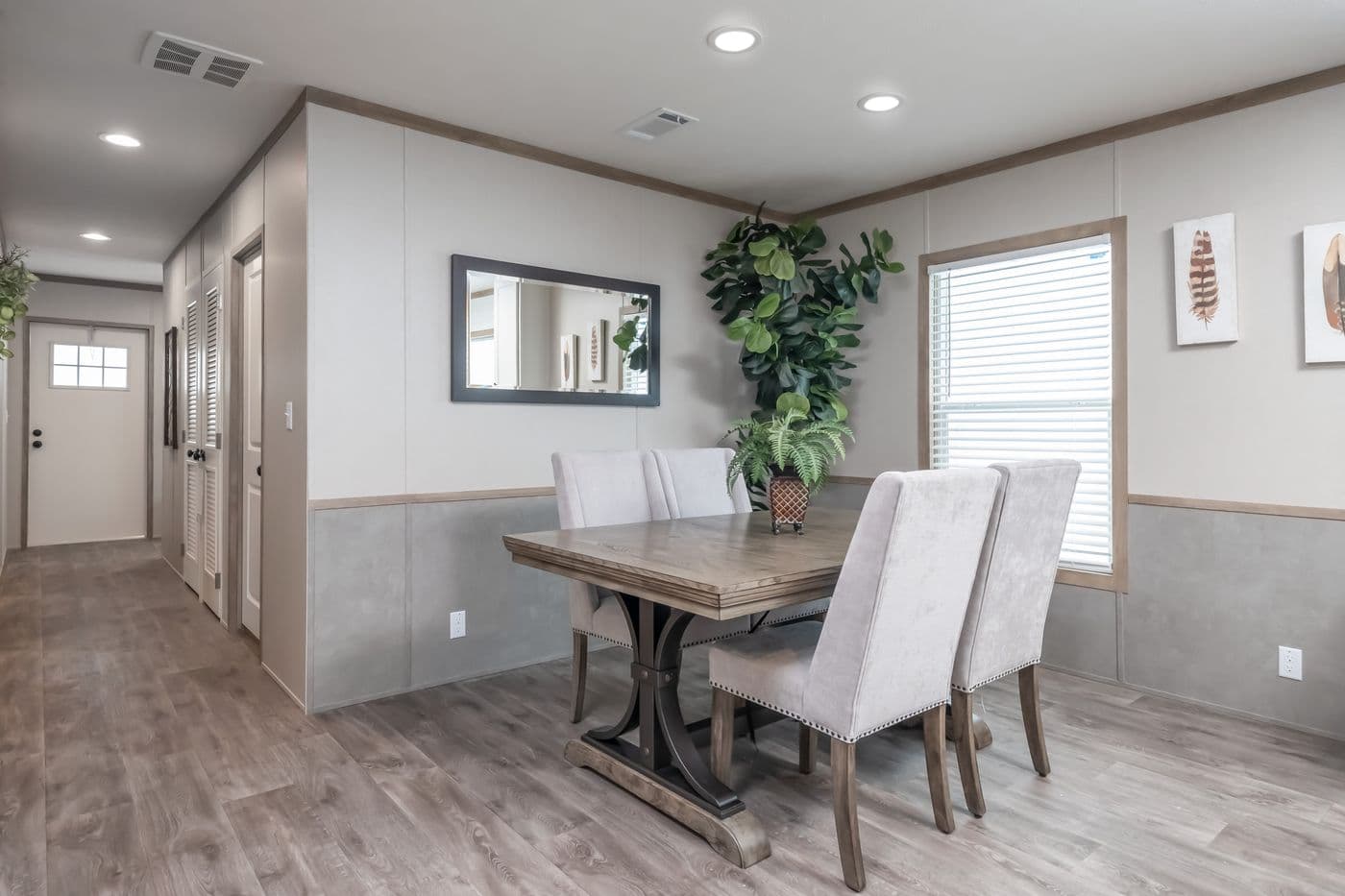 The PT 78 Dining Area. This Manufactured Mobile Home features 3 bedrooms and 2 baths.