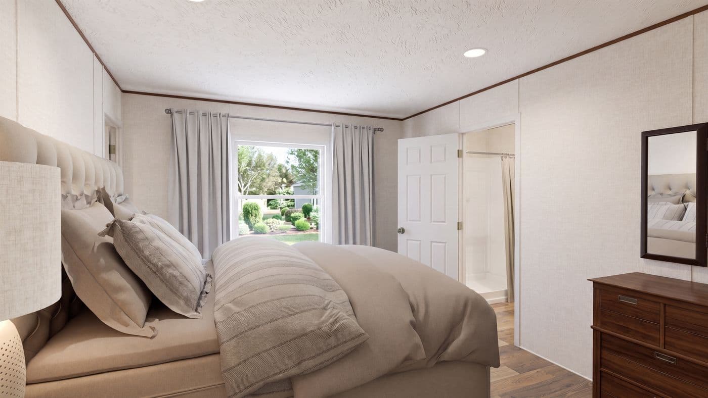 The BIRCH Primary Bedroom. This Manufactured Mobile Home features 3 bedrooms and 2 baths.