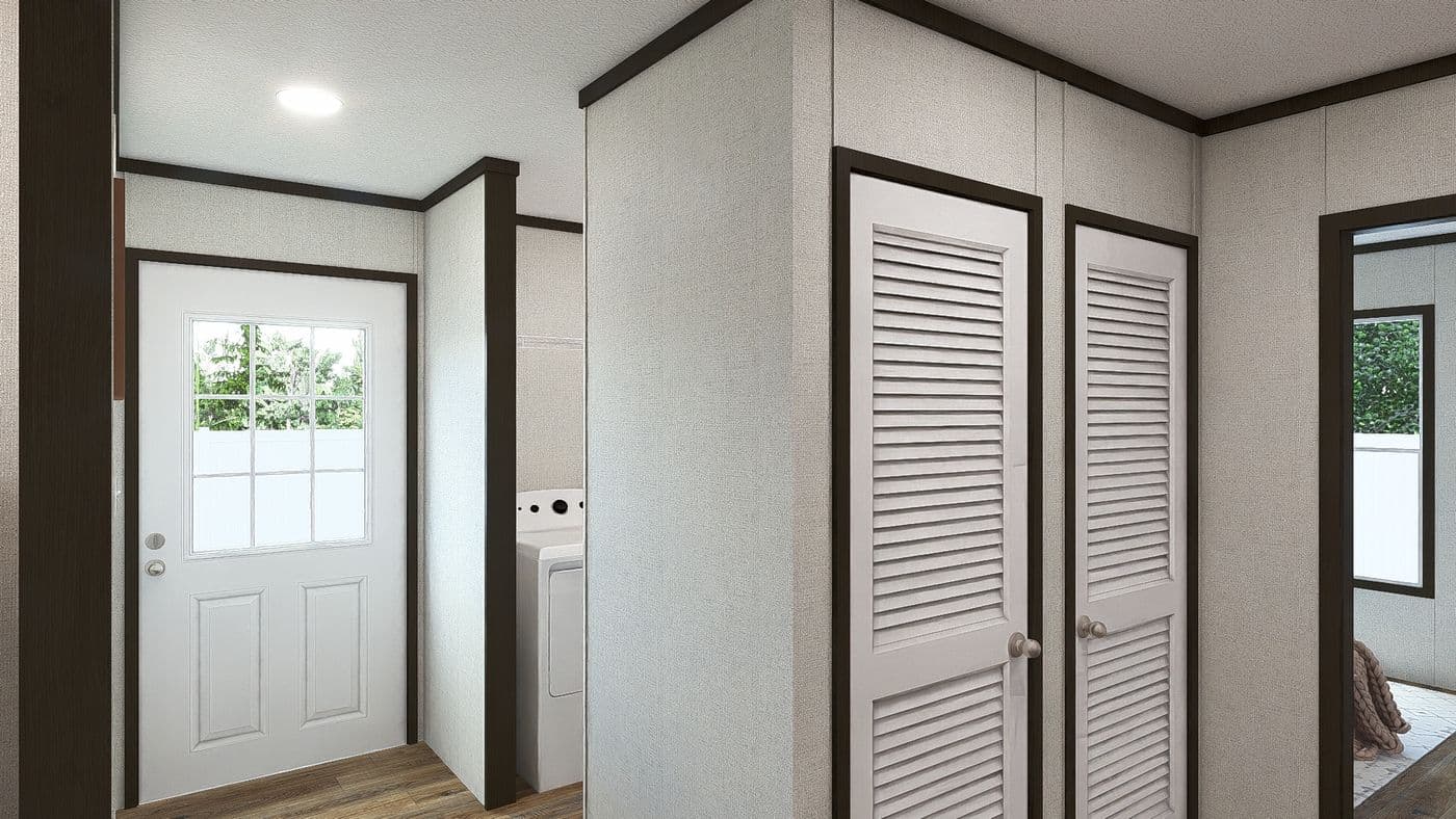 The IMPACT Utility Room. This Manufactured Mobile Home features 4 bedrooms and 2 baths.