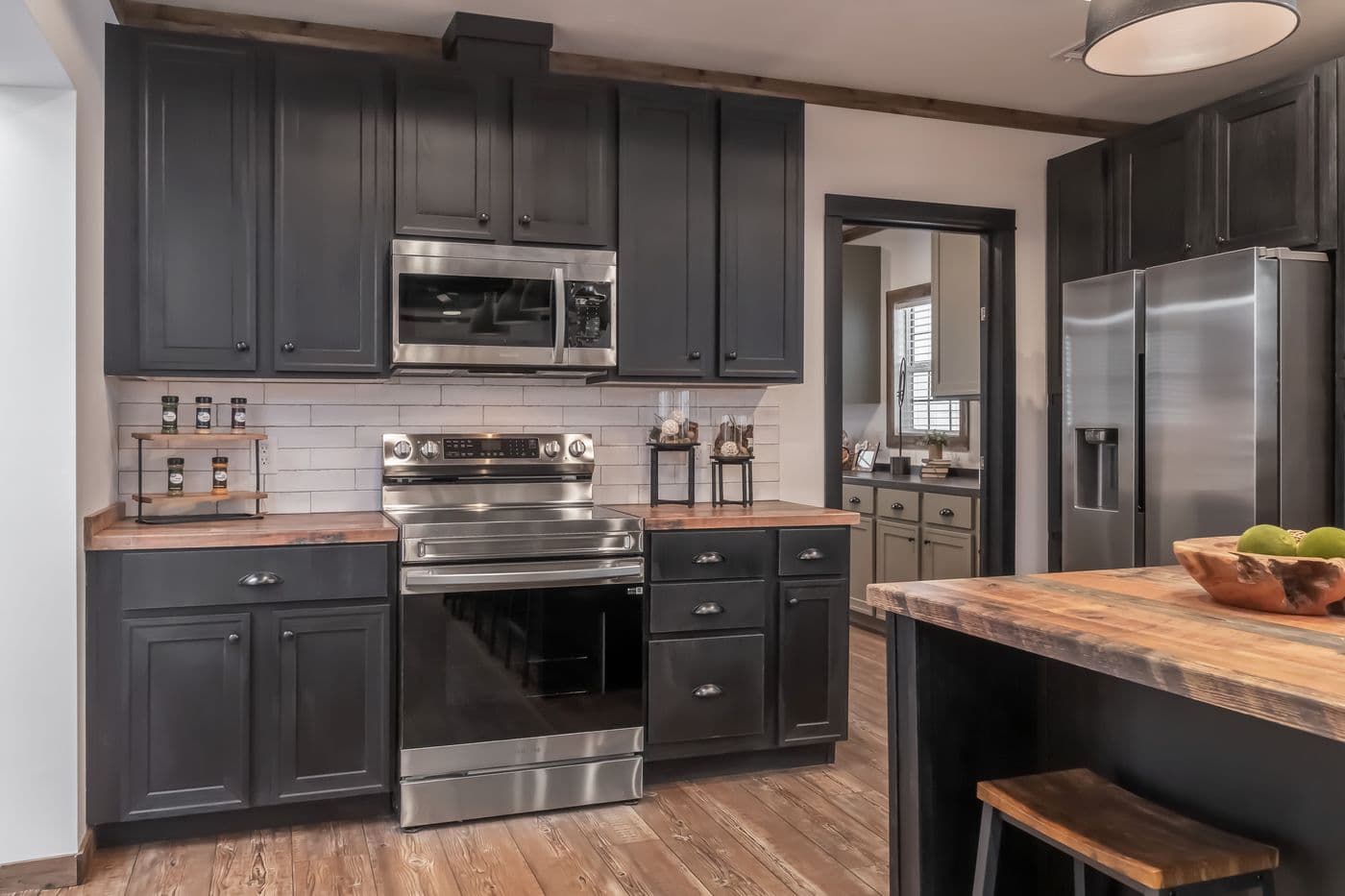 The THE MILL HOUSE Kitchen. This Manufactured Mobile Home features 3 bedrooms and 2 baths.