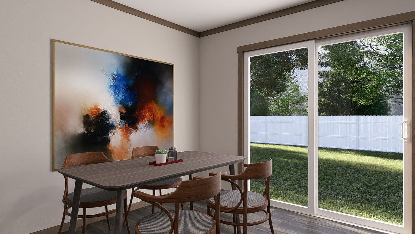 The EMILIE Dining Room. This Manufactured Mobile Home features 3 bedrooms and 2 baths.