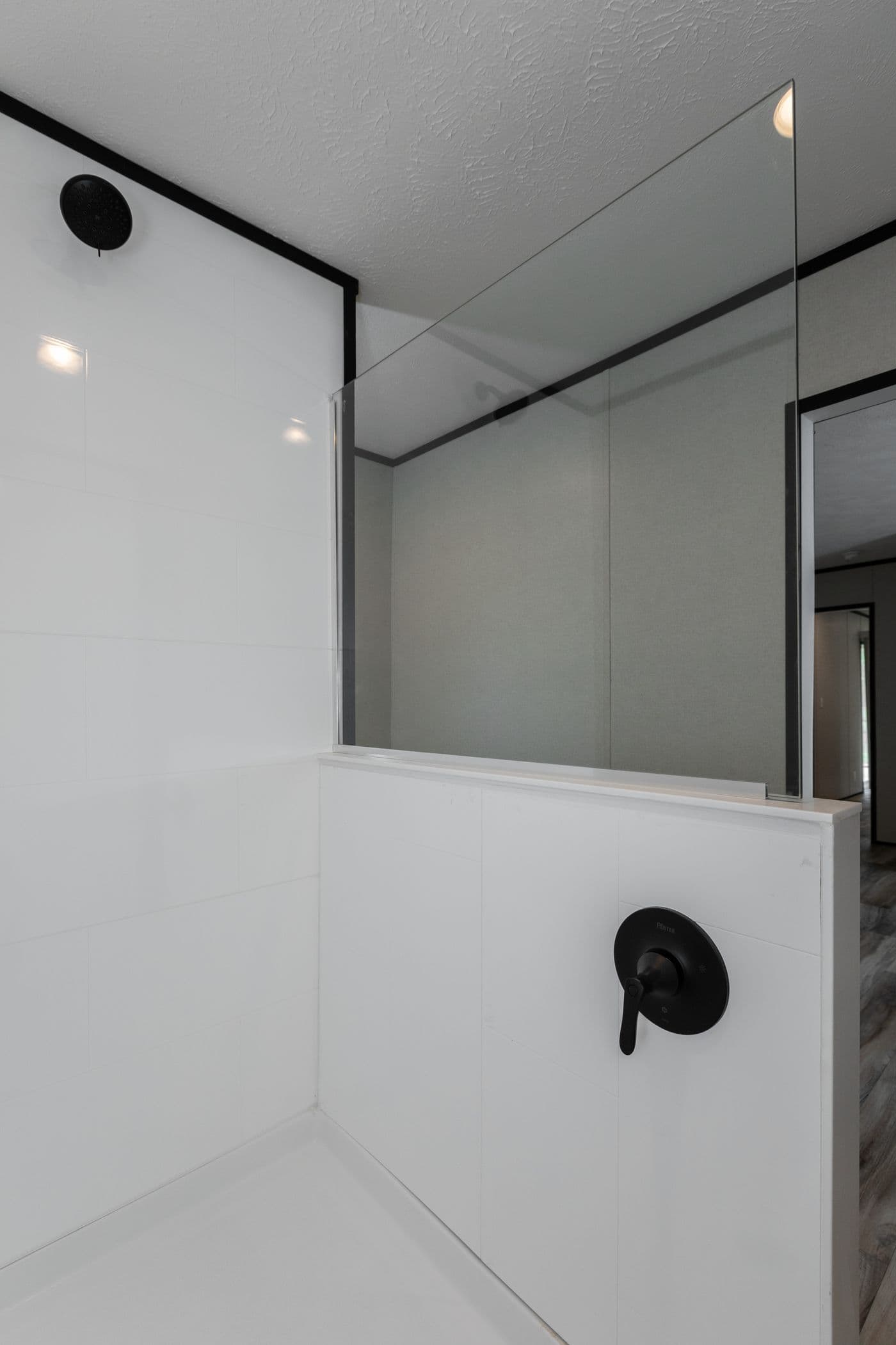 The THE SMOKEY Primary Bathroom. This Manufactured Mobile Home features 3 bedrooms and 2 baths.