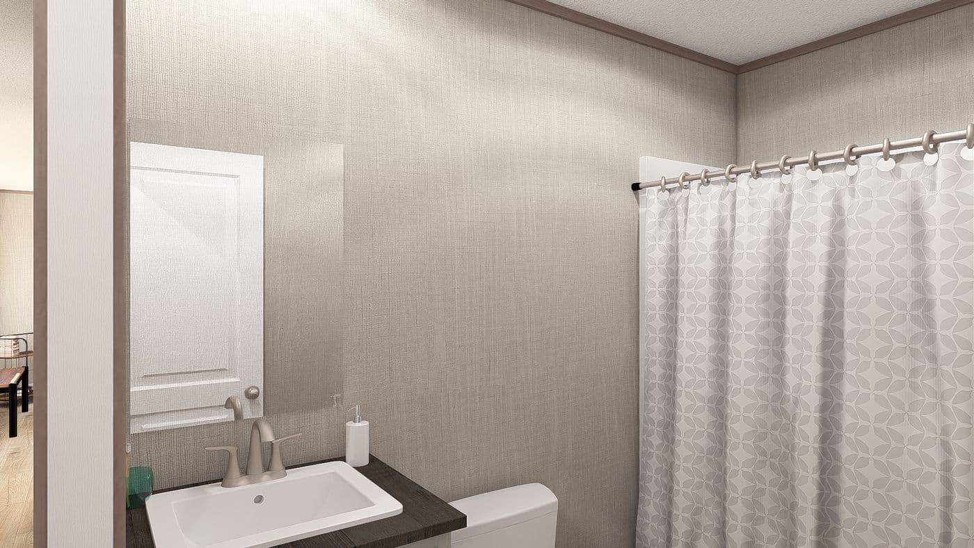 The ULTRA A-PLUS 16X76 Guest Bathroom. This Manufactured Mobile Home features 3 bedrooms and 2 baths.