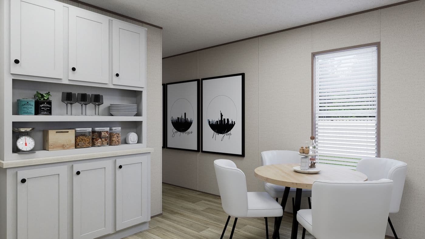 The GLACIER VISTA Dining Area. This Manufactured Mobile Home features 4 bedrooms and 2 baths.