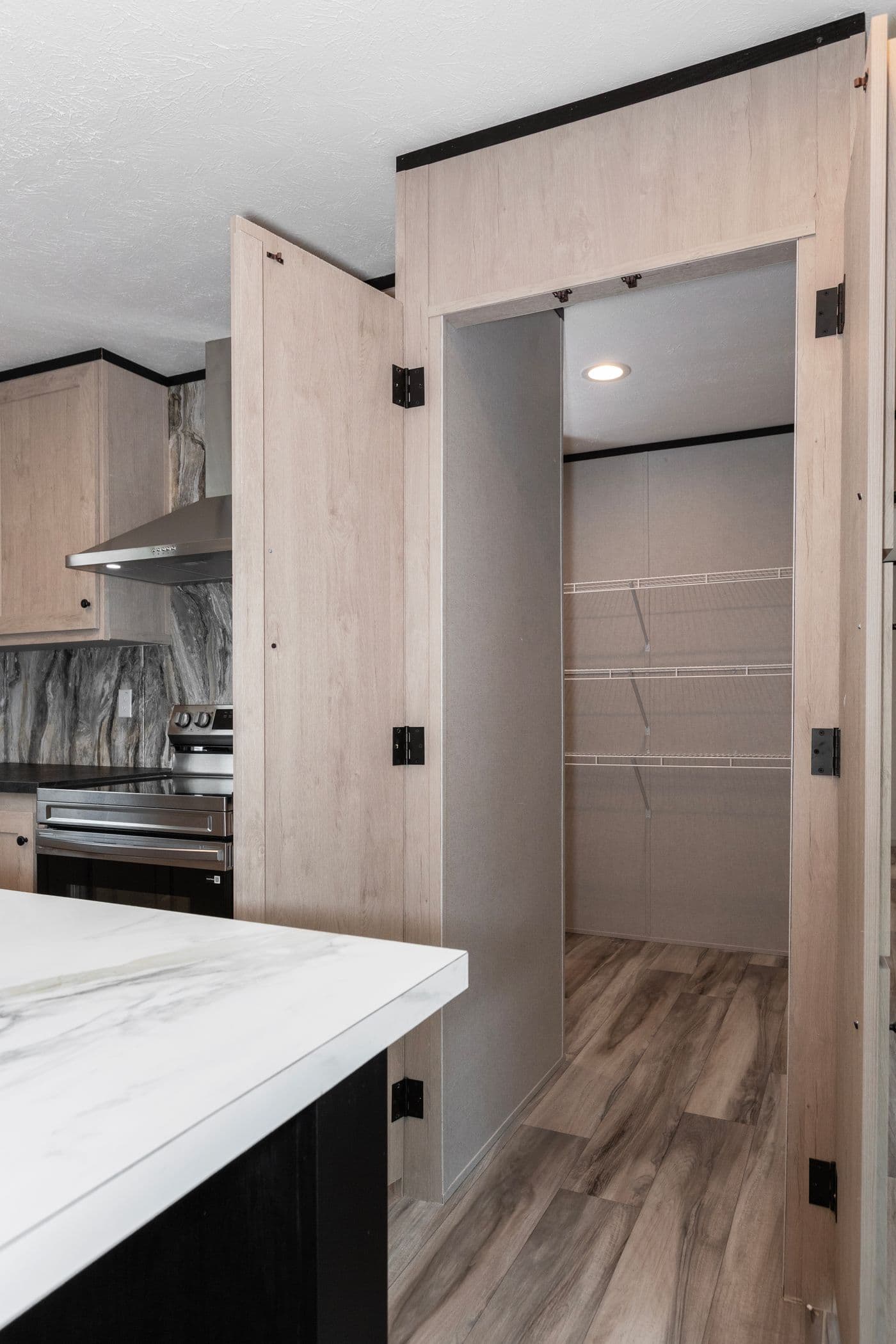 The THE FUJI Kitchen. This Manufactured Mobile Home features 3 bedrooms and 2 baths.