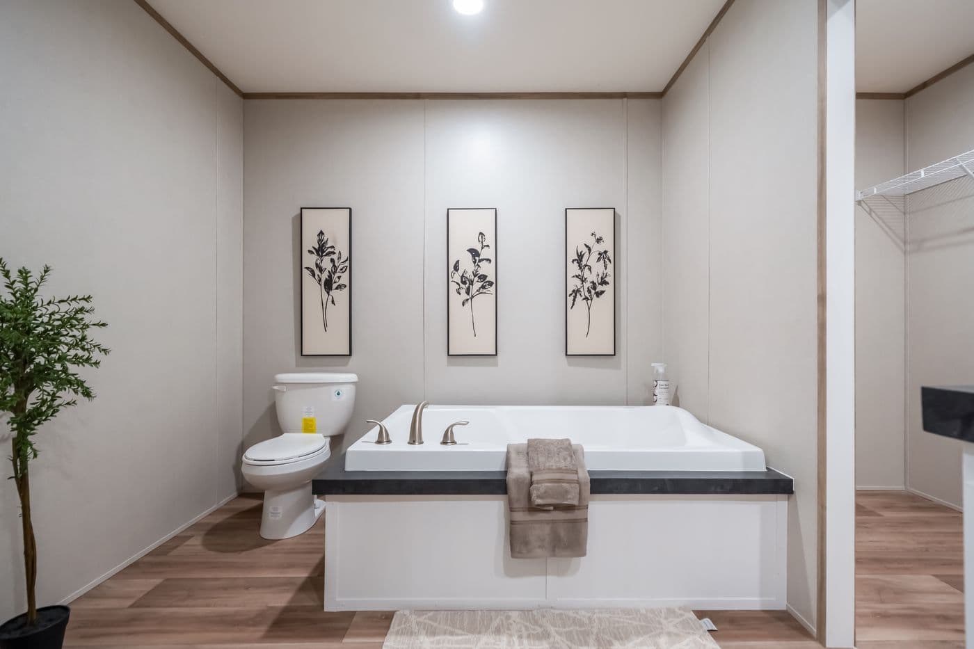 The ECLIPSE Primary Bathroom. This Manufactured Mobile Home features 4 bedrooms and 2 baths.