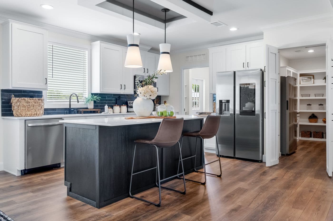 The THE IRON PEAK Kitchen. This Manufactured Mobile Home features 4 bedrooms and 2 baths.