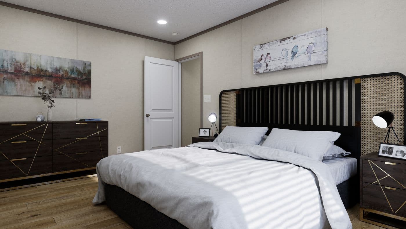 The 7016-CC03 HARBORVIEW 70 Primary Bedroom. This Manufactured Mobile Home features 3 bedrooms and 2 baths.