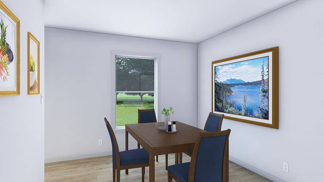 The LET IT BE Dining Room. This Manufactured Mobile Home features 3 bedrooms and 2 baths.
