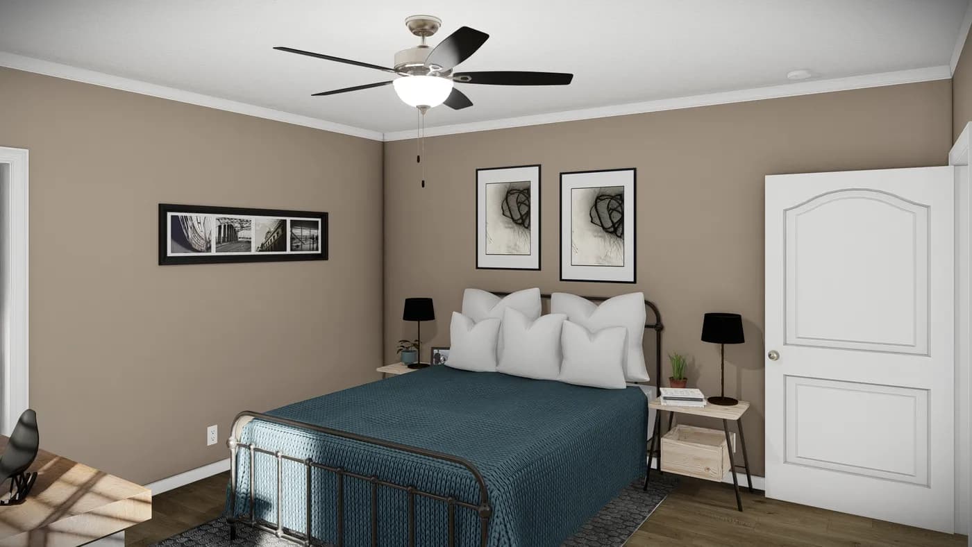 The THE BANDON Primary Bedroom. This Manufactured Mobile Home features 3 bedrooms and 2 baths.
