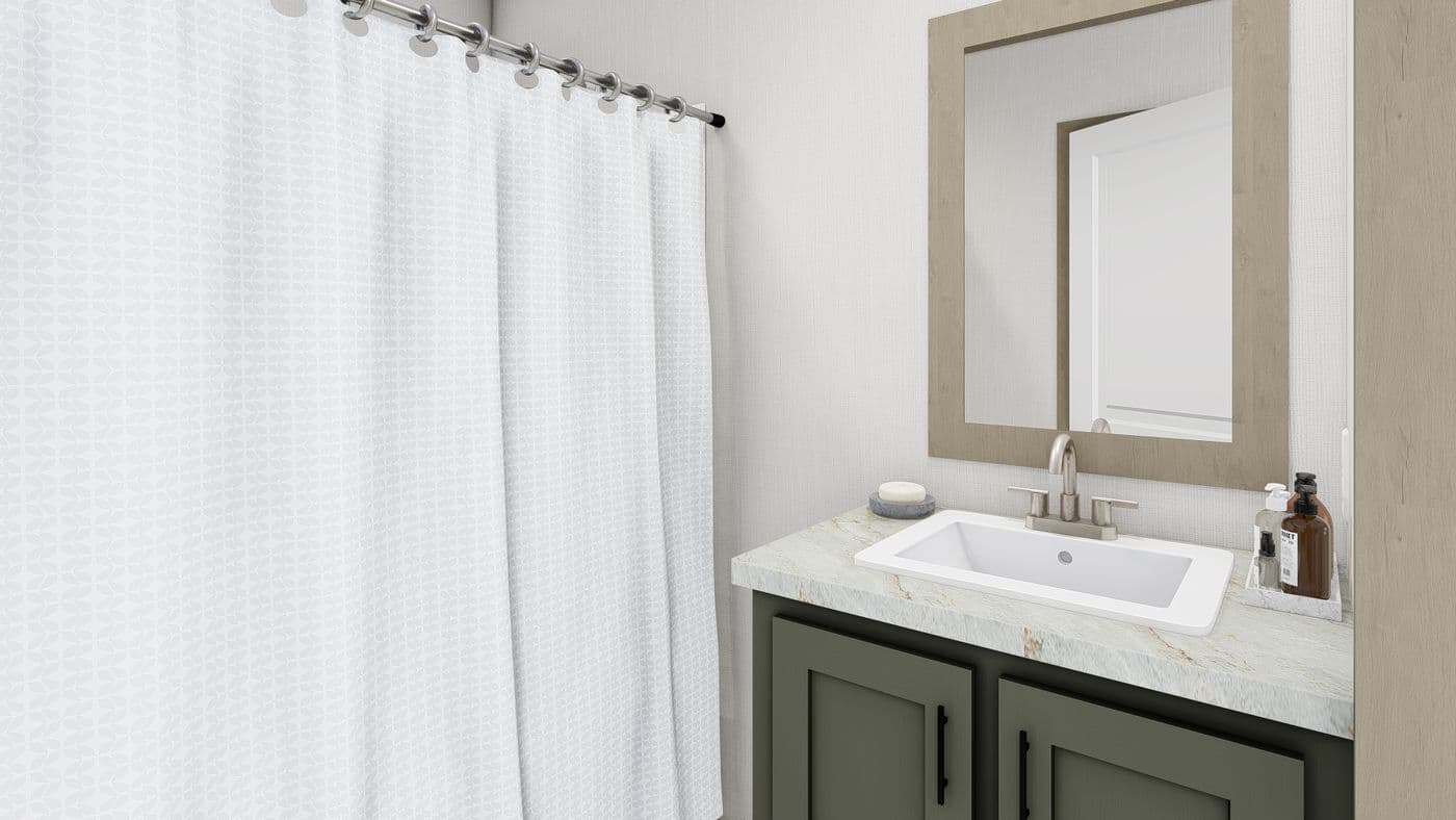The LEWIS Guest Bathroom. This Manufactured Mobile Home features 2 bedrooms and 2 baths.