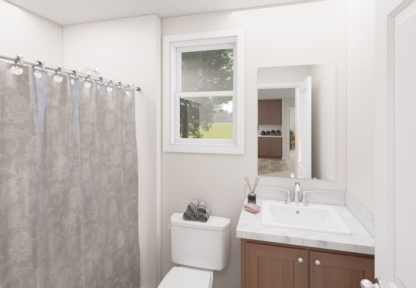 The 5019 IMAGINE Guest Bathroom. This Manufactured Mobile Home features 3 bedrooms and 2 baths.