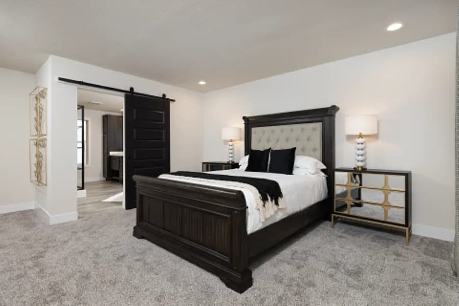 The STRATFORD PL 6630-MS062 SECT Primary Bedroom. This Manufactured Mobile Home features 3 bedrooms and 2 baths.