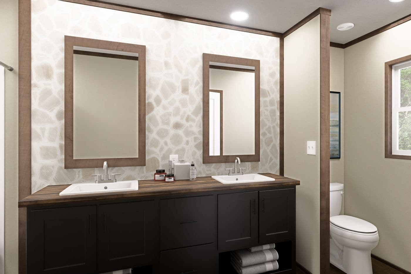 The VOYAGE Primary Bathroom. This Manufactured Mobile Home features 3 bedrooms and 2 baths.