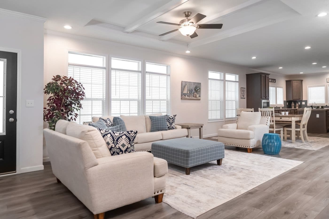 The 3458 MOD 76X32 CAROLINA RAELYN Living Room. This Modular Home features 4 bedrooms and 3 baths.