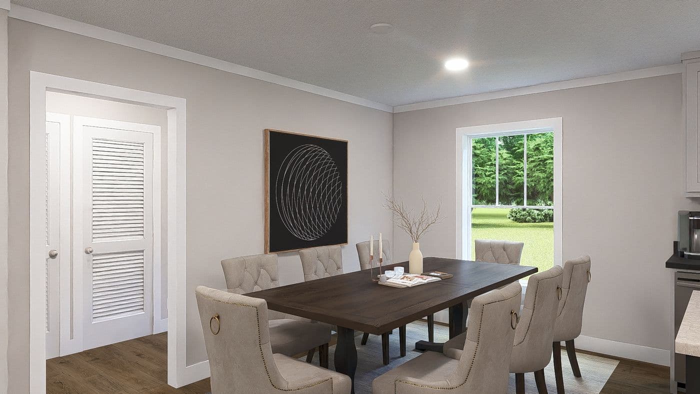 The LEAN ON ME Dining Room. This Manufactured Mobile Home features 3 bedrooms and 2 baths.