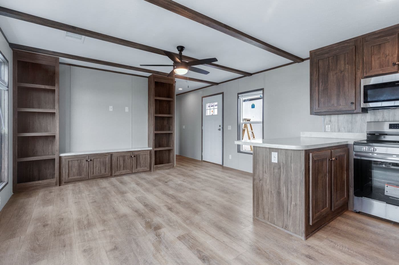 The ANNIVERSARY 16683B Kitchen. This Manufactured Mobile Home features 3 bedrooms and 2 baths.