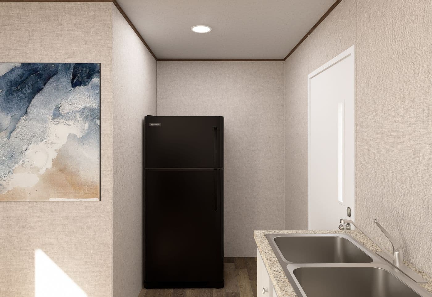 The BUTTERCUP Utility Room. This Manufactured Mobile Home features 1 bedroom and 1 bath.
