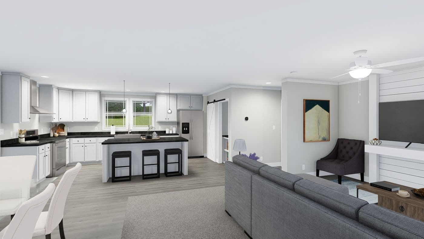 The THE BREEZE Living Room. This Manufactured Mobile Home features 3 bedrooms and 2 baths.