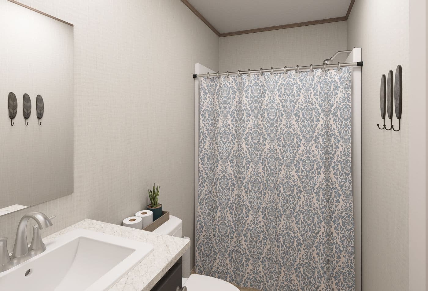 The ULTRA FLEX ANNIVERSARY PLUS Guest Bathroom. This Manufactured Mobile Home features 3 bedrooms and 2 baths.