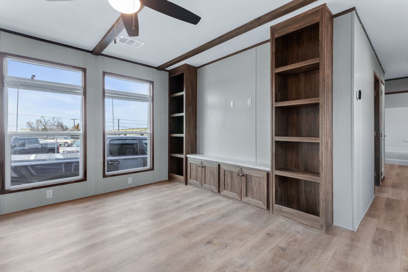 The ANNIVERSARY 16683B Living Room. This Manufactured Mobile Home features 3 bedrooms and 2 baths.