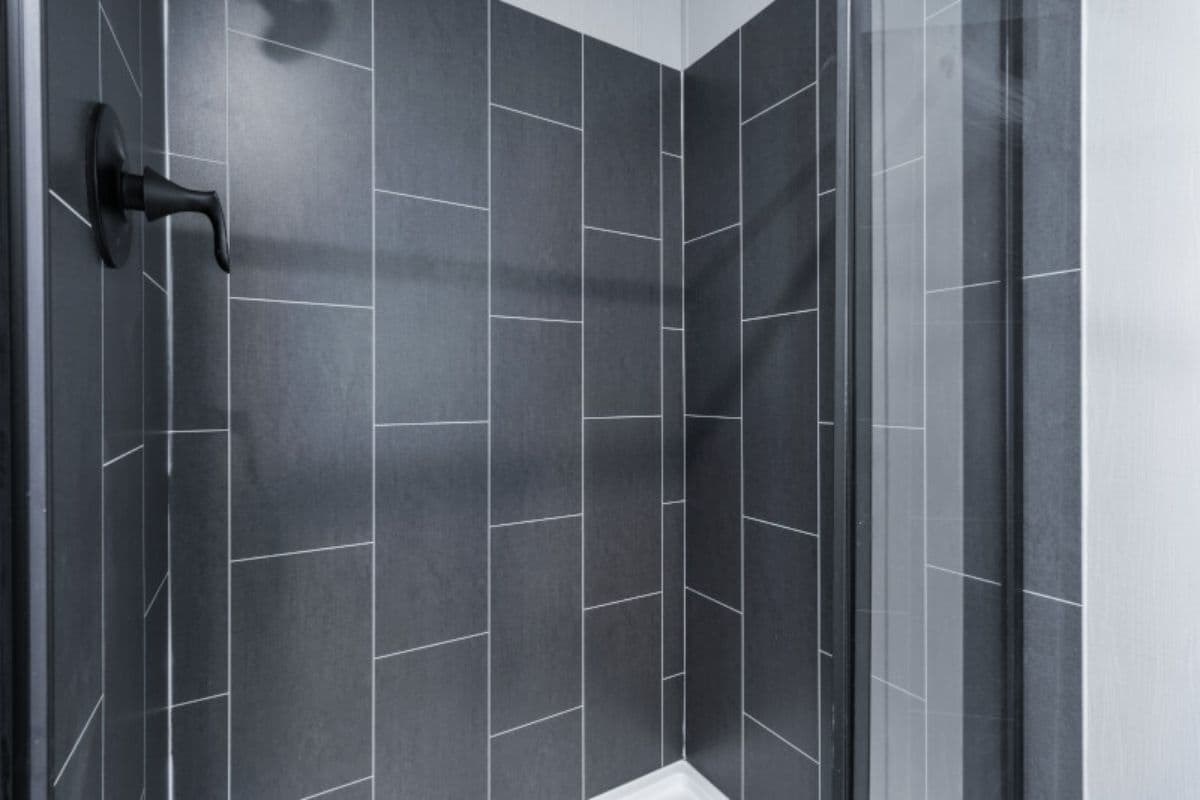 The ANNIVERSARY 16763S Primary Bathroom. This Manufactured Mobile Home features 3 bedrooms and 2 baths.