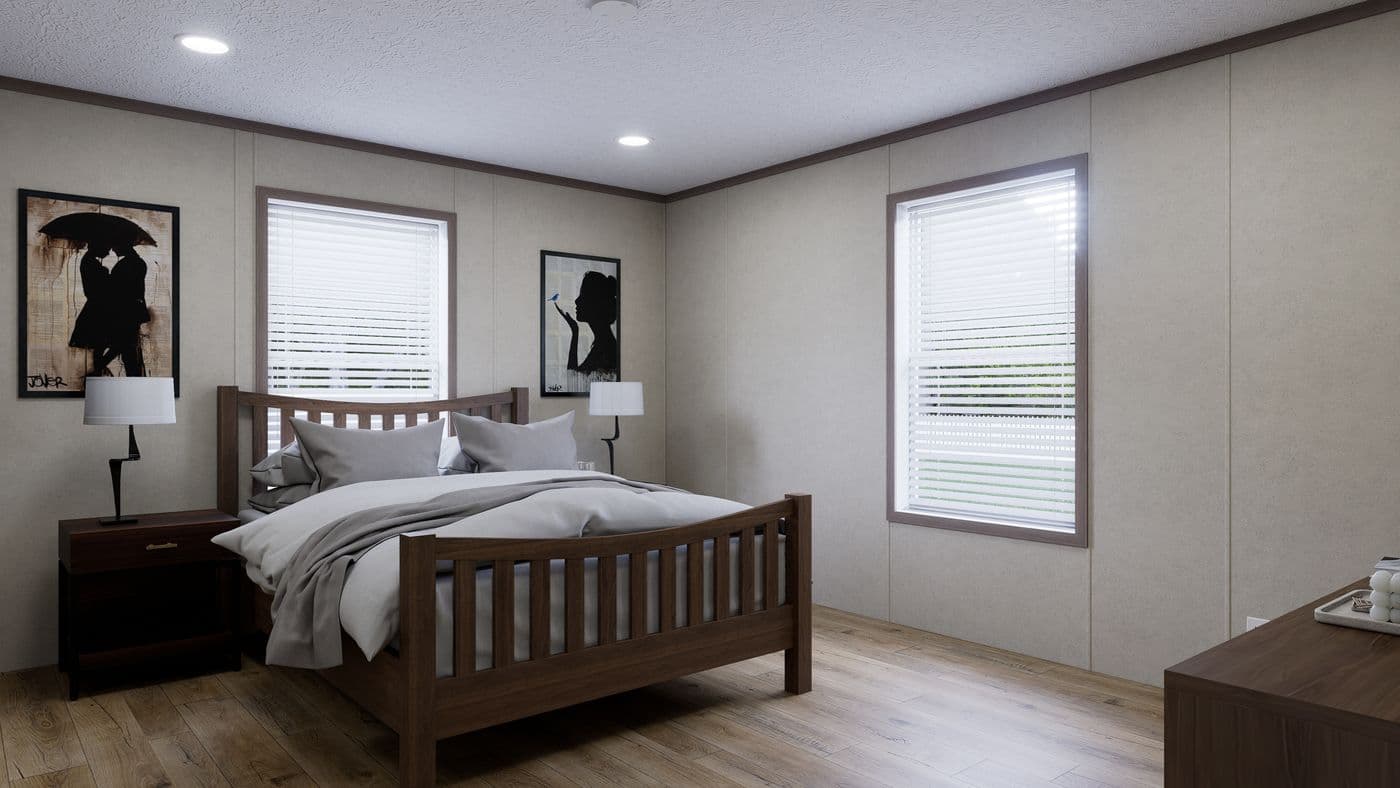 The 5228-CC51 PILLAR 52 Primary Bedroom. This Manufactured Mobile Home features 3 bedrooms and 2 baths.