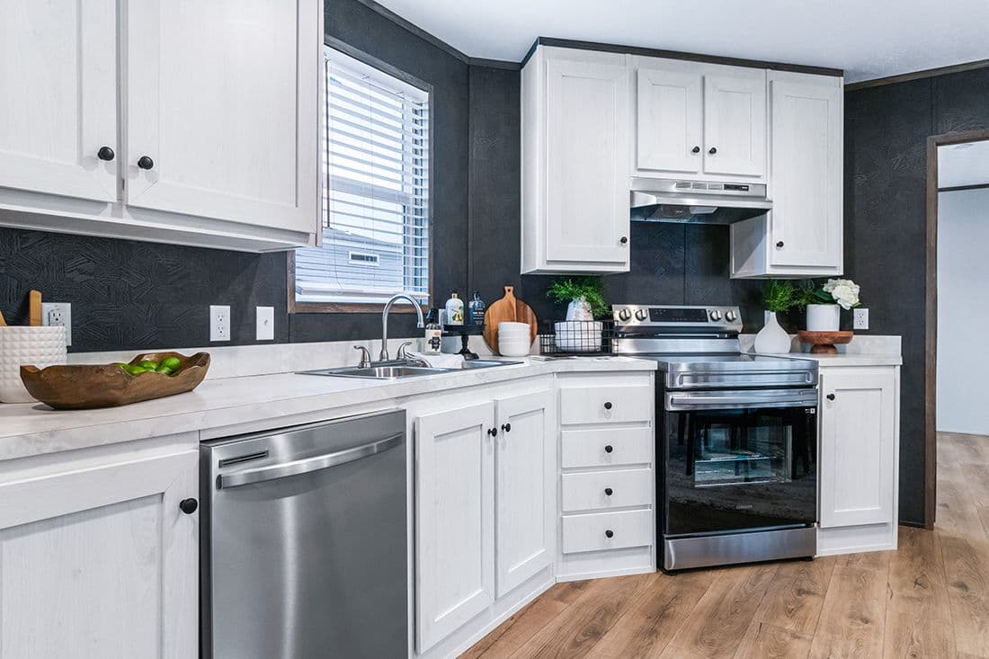 The SELECT 16723F Kitchen. This Manufactured Mobile Home features 3 bedrooms and 2 baths.
