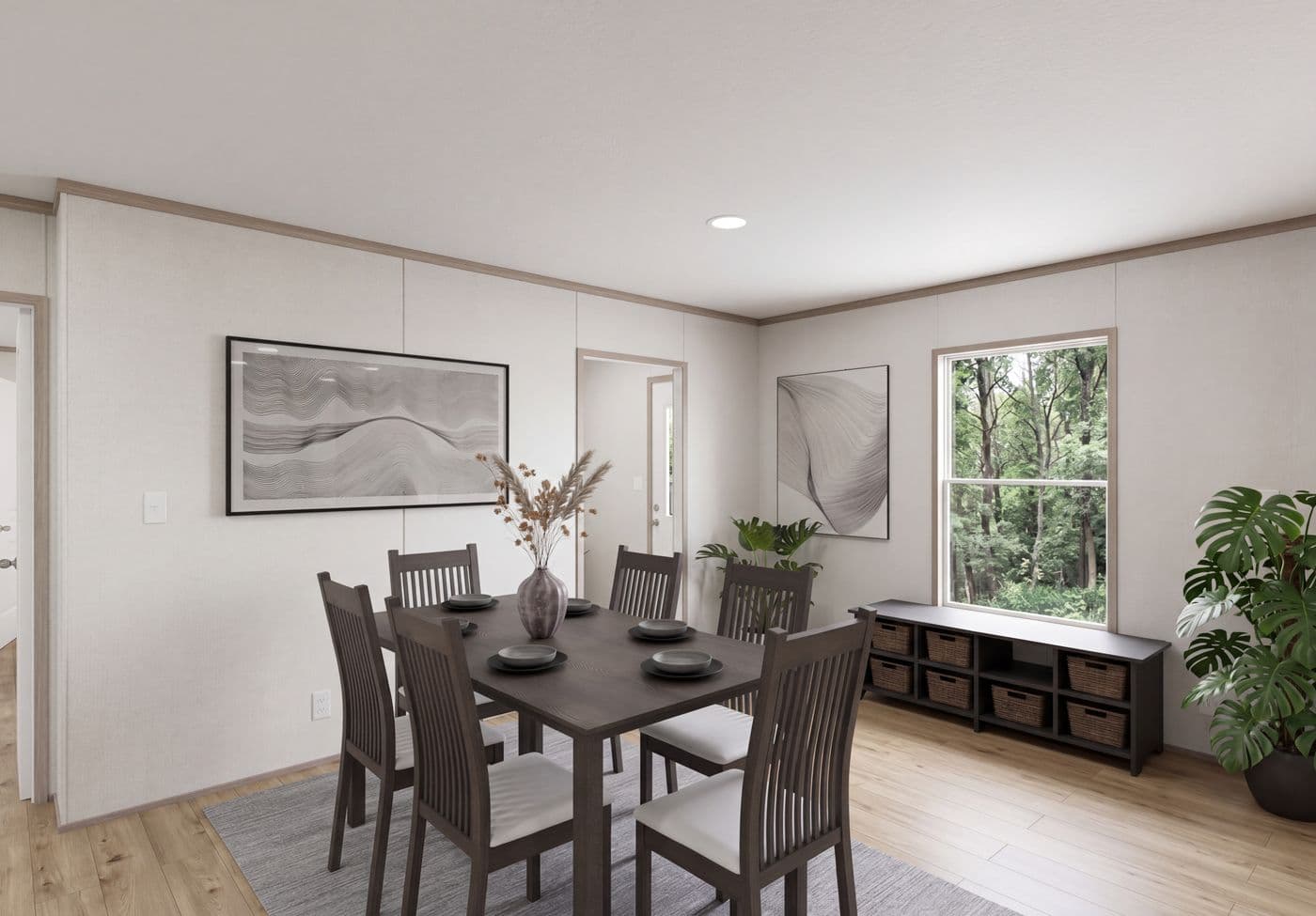 The THE MOUNTAINEER 64 Dining Area. This Manufactured Mobile Home features 3 bedrooms and 2 baths.