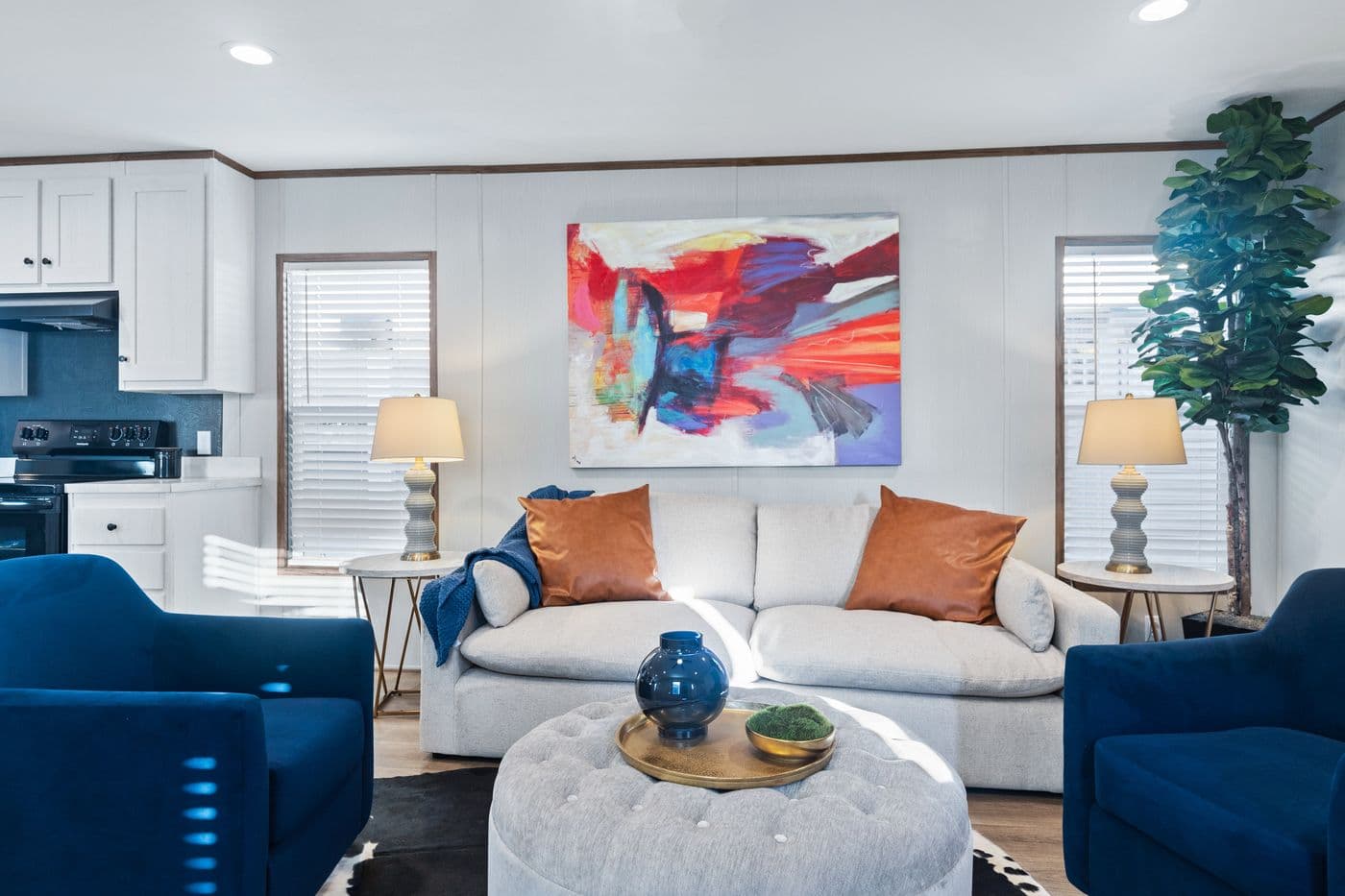The HOMESTEAD 16763A Living Room. This Manufactured Mobile Home features 3 bedrooms and 2 baths.