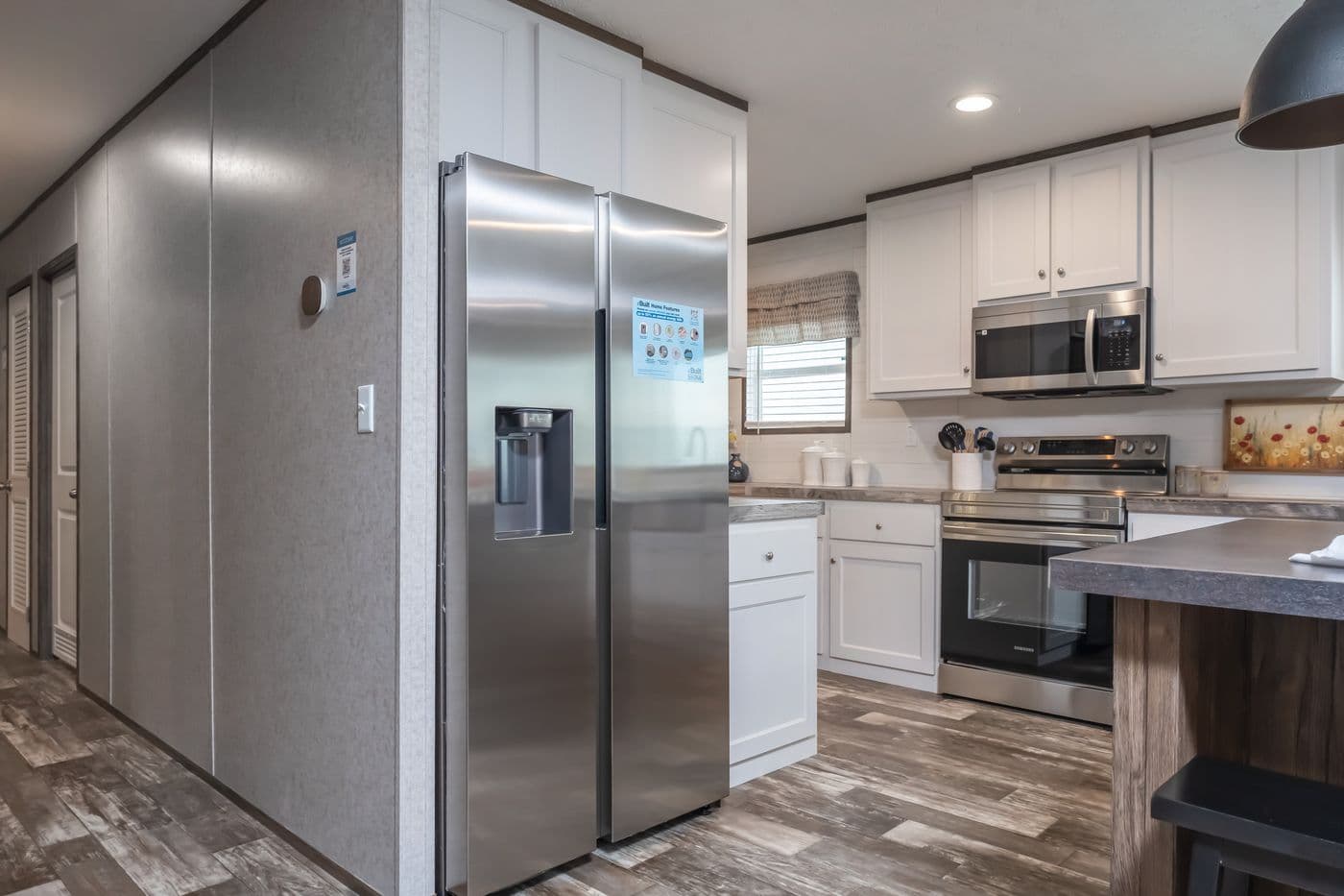The LOCKLEAR Exterior. This Manufactured Mobile Home features 4 bedrooms and 2 baths.