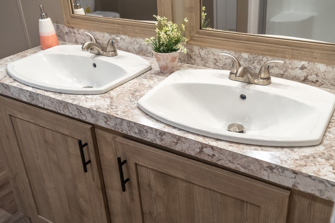 The TRADITION 56D Primary Bathroom. This Manufactured Mobile Home features 3 bedrooms and 2 baths.