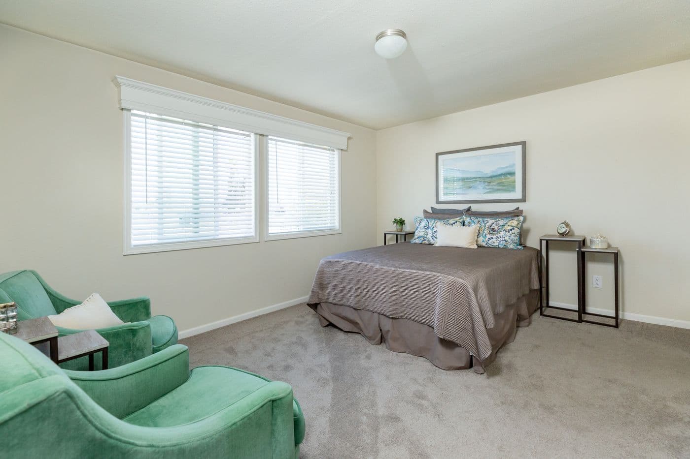 The FAIRPOINT 27543F Primary Bedroom. This Manufactured Mobile Home features 3 bedrooms and 2 baths.