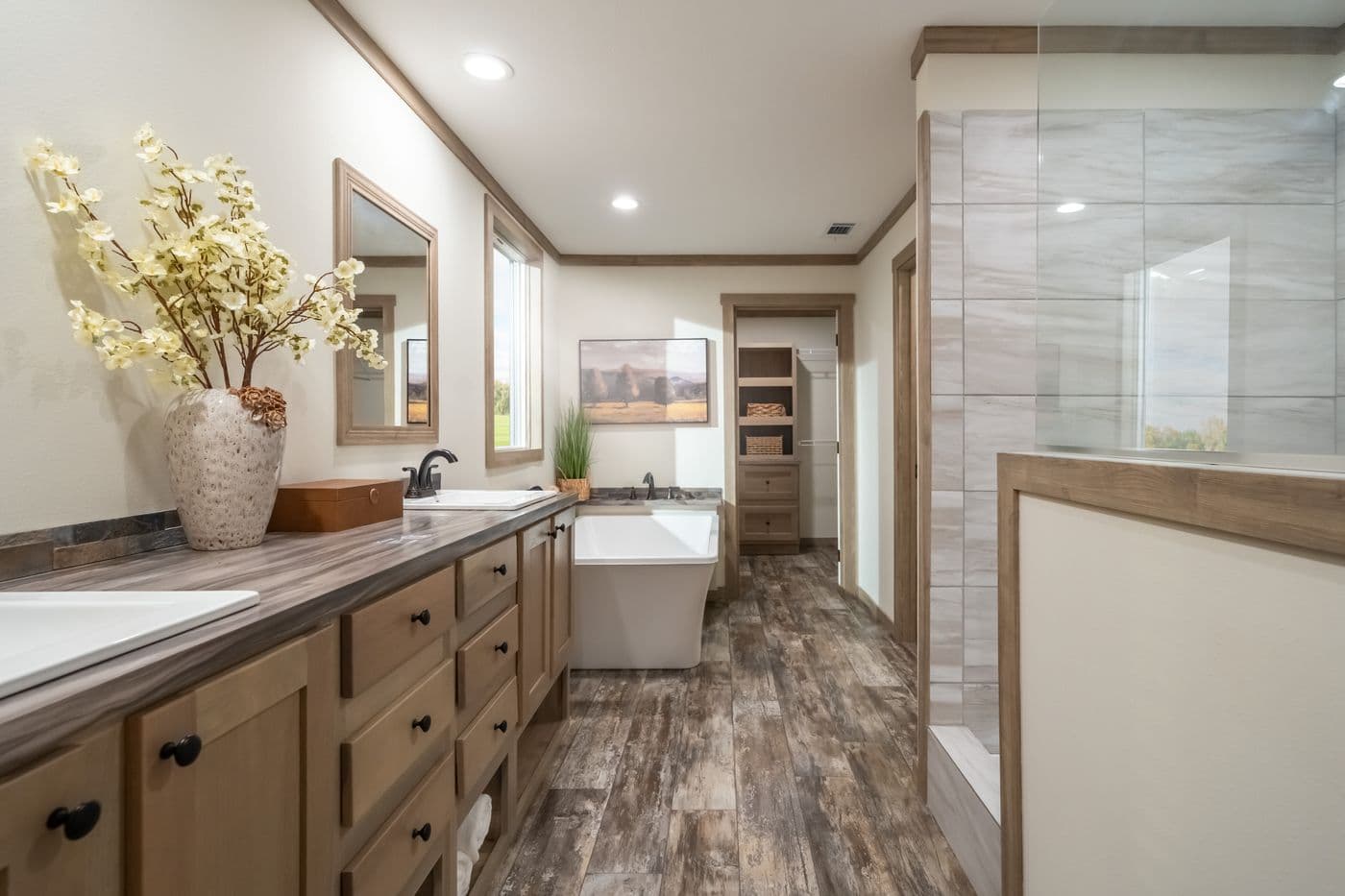 The BOUJEE PREMIER Primary Bathroom. This Manufactured Mobile Home features 4 bedrooms and 2 baths.