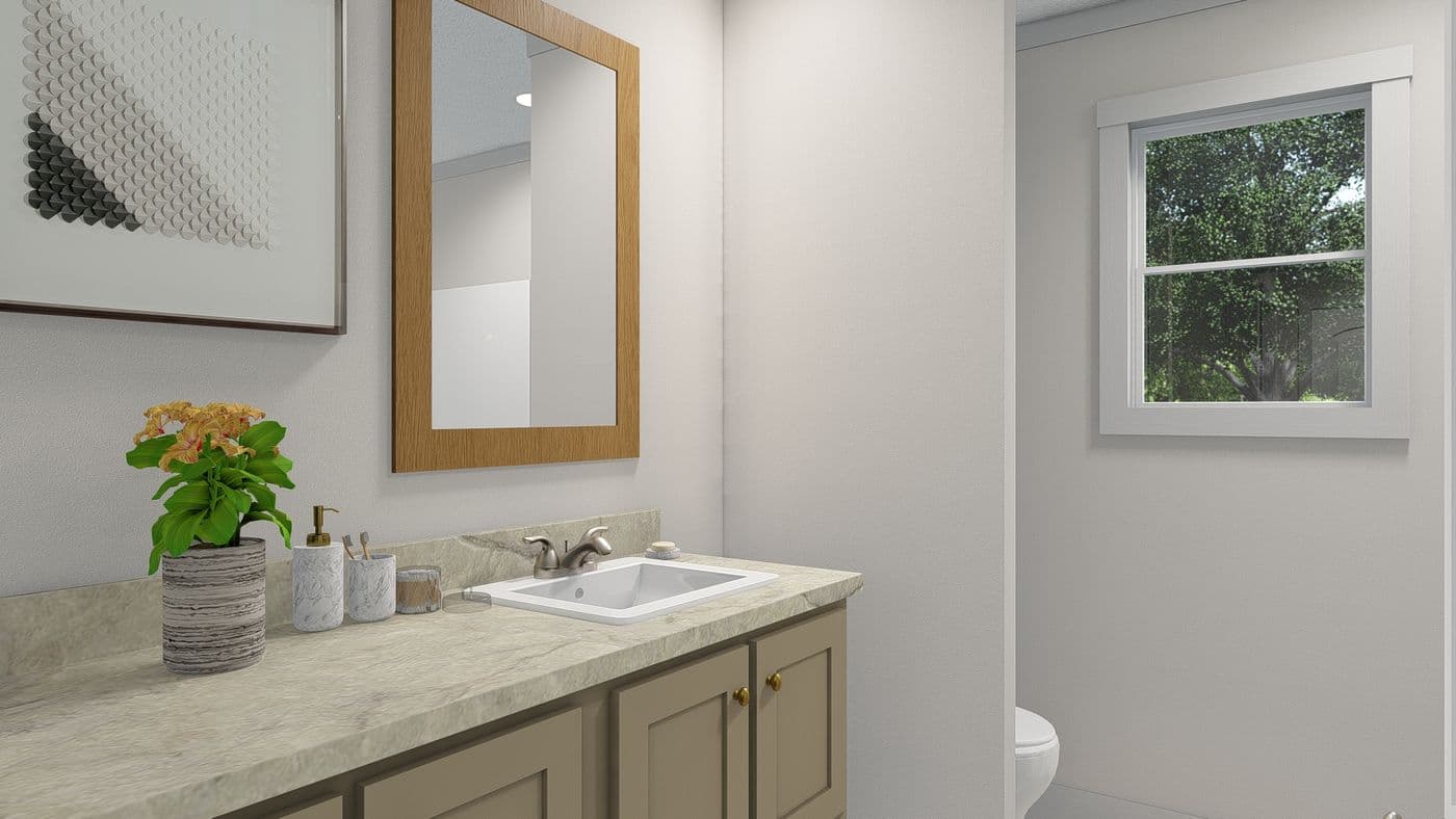 The 2003 "ROCKET MAN" 6628 Guest Bathroom. This Manufactured Mobile Home features 3 bedrooms and 2 baths.