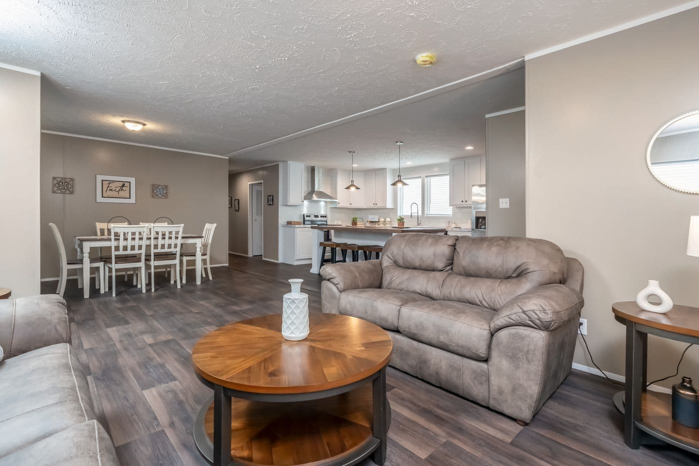 The ISLAND BREEZE 64 Living Room. This Manufactured Mobile Home features 4 bedrooms and 2 baths.