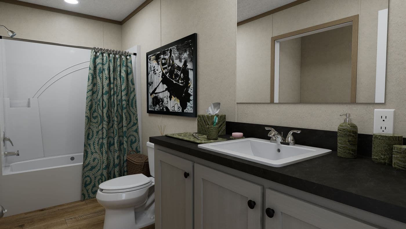 The 4828-CC51 PILLAR 48 Primary Bathroom. This Manufactured Mobile Home features 3 bedrooms and 2 baths.