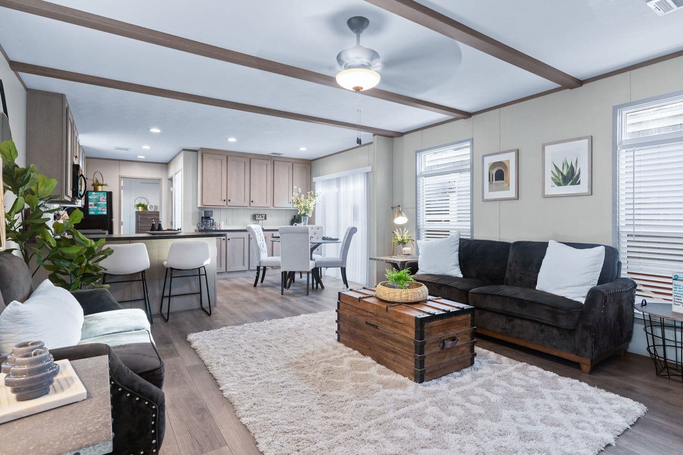 The ANNIVERSARY 16763A Living Room. This Manufactured Mobile Home features 3 bedrooms and 2 baths.