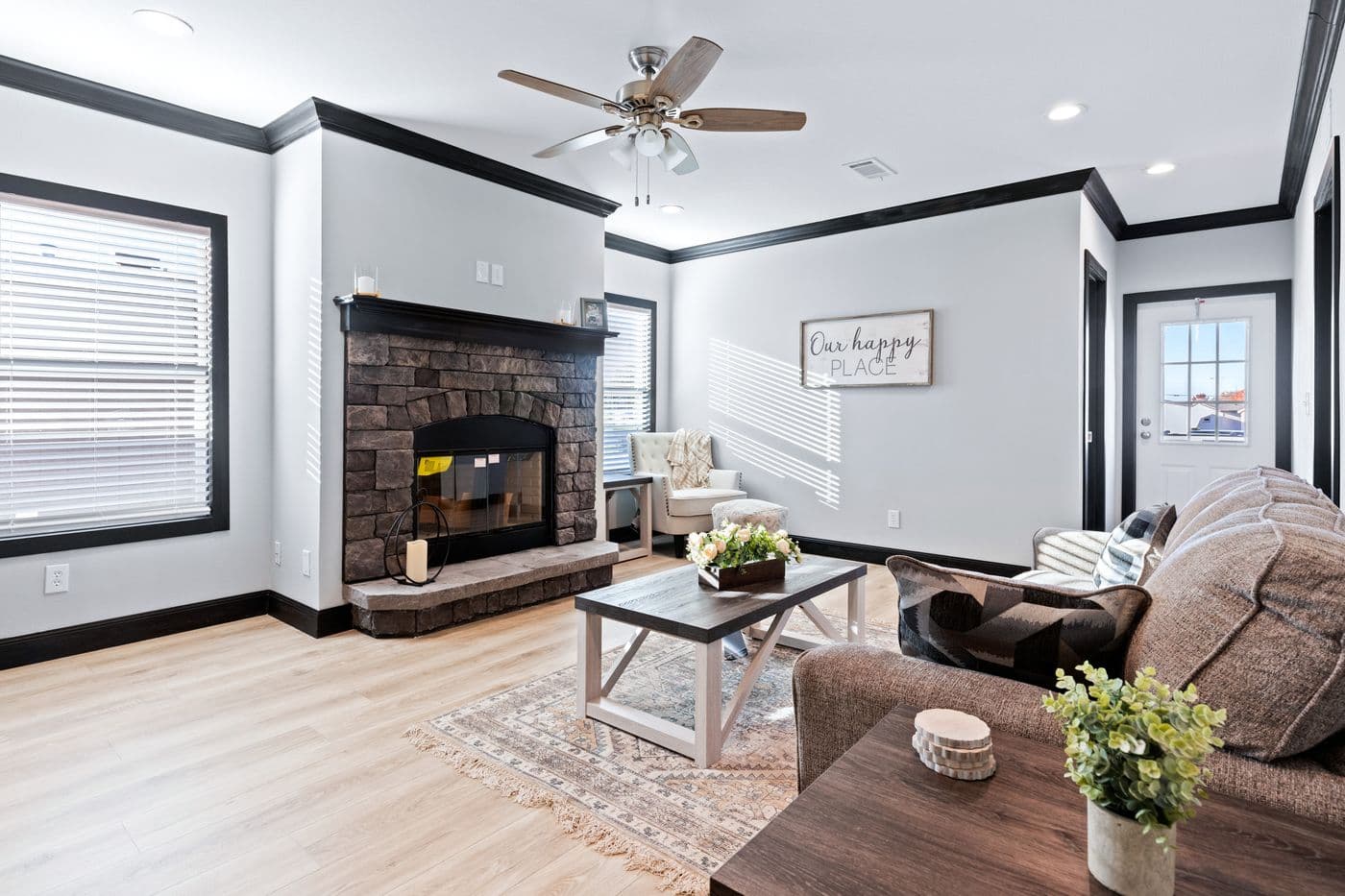 The THE LOUIS Family Room. This Manufactured Mobile Home features 4 bedrooms and 3 baths.