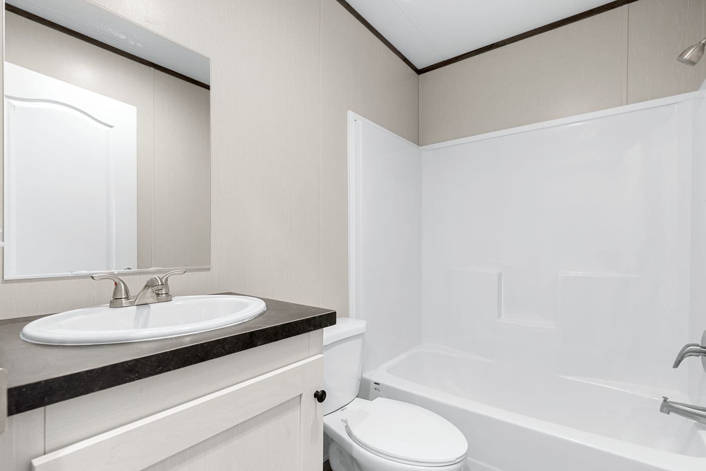The RESOLUTION 16682X Guest Bathroom. This Manufactured Mobile Home features 2 bedrooms and 2 baths.