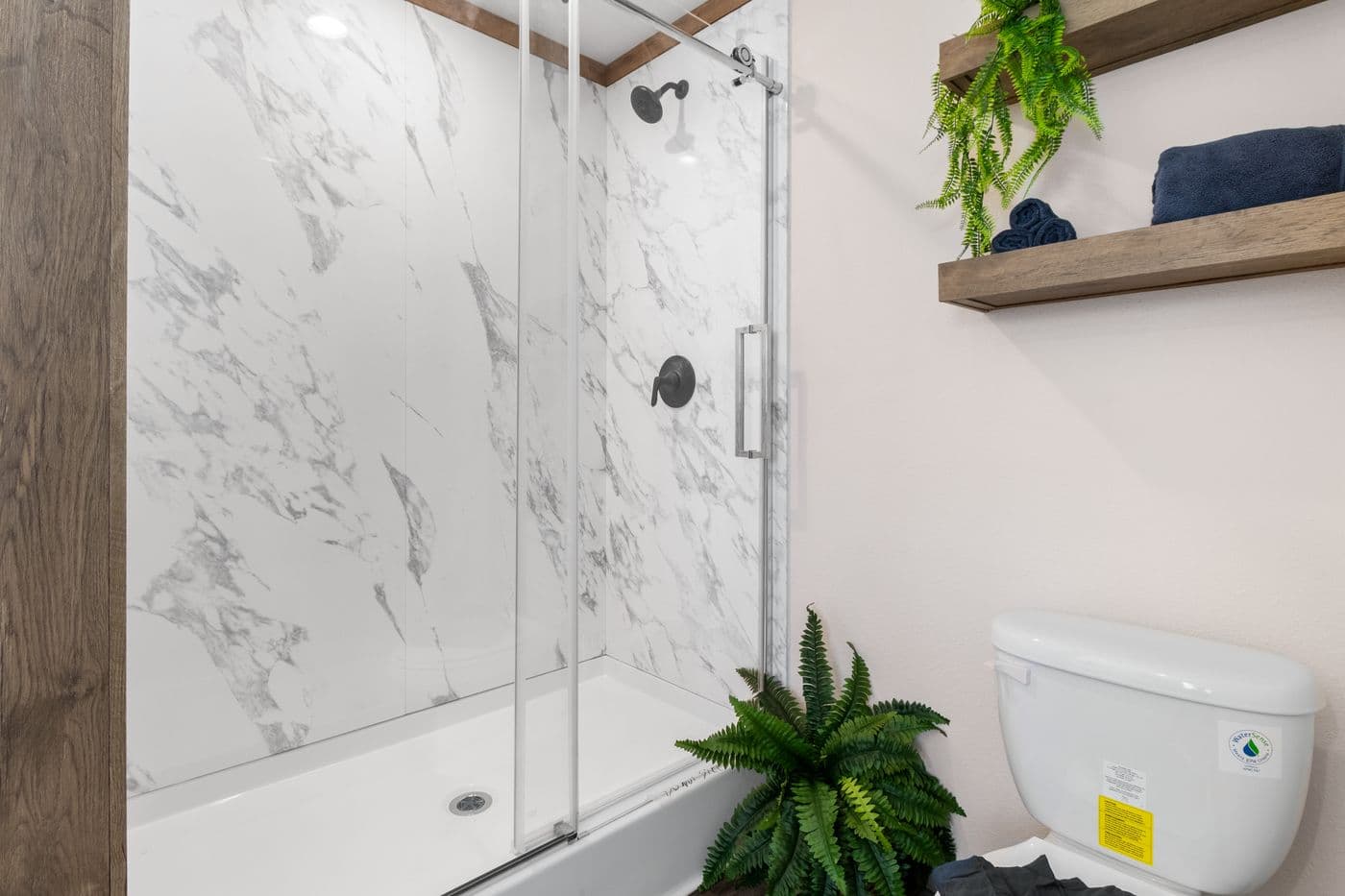 The FARM 4 FLEX Primary Bathroom. This Manufactured Mobile Home features 4 bedrooms and 3 baths.