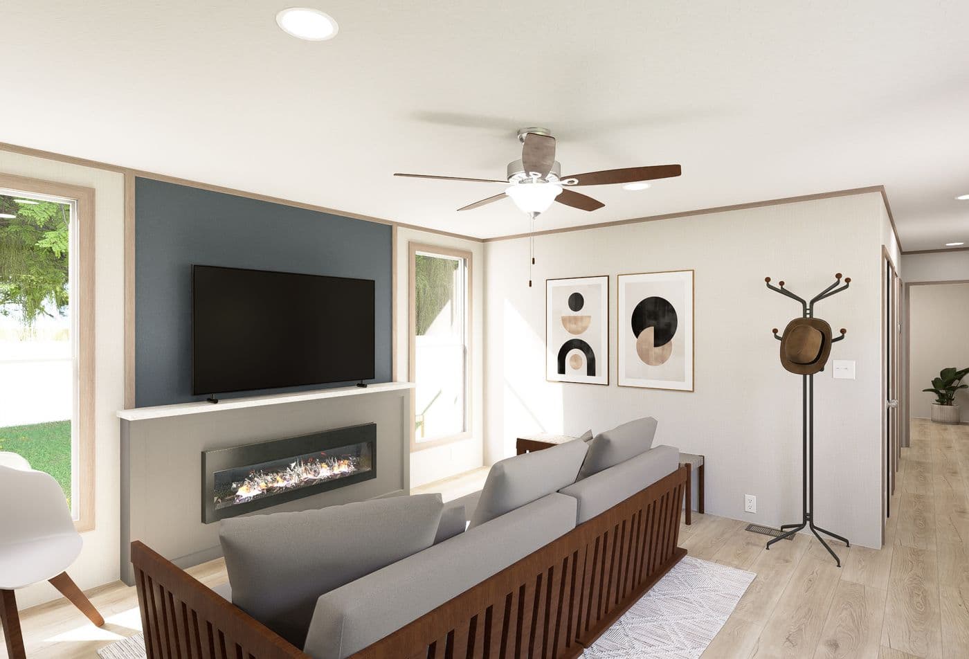 The ULTRA FLEX ANNIVERSARY PLUS Living Room. This Manufactured Mobile Home features 3 bedrooms and 2 baths.